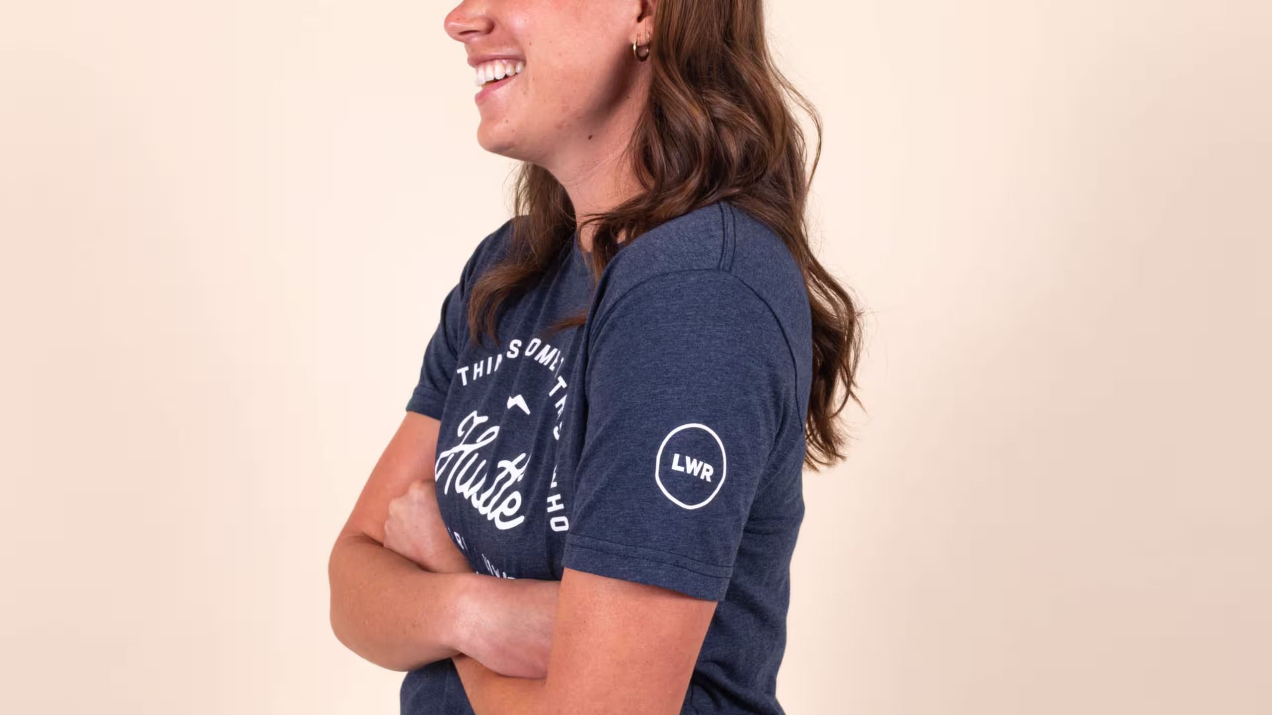 women wearing a navy tri-blend t-shirt