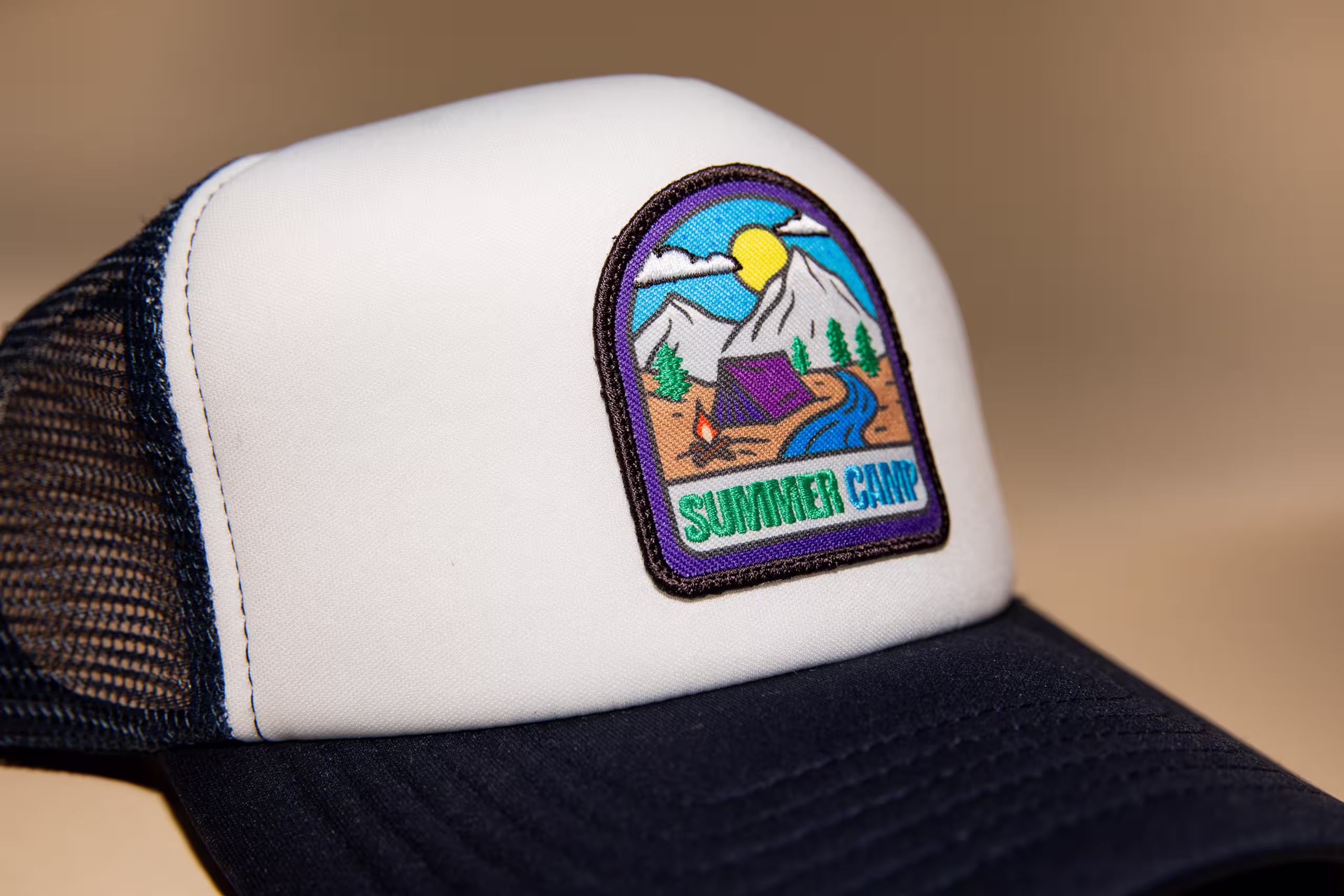 woven patch on a white and black hat