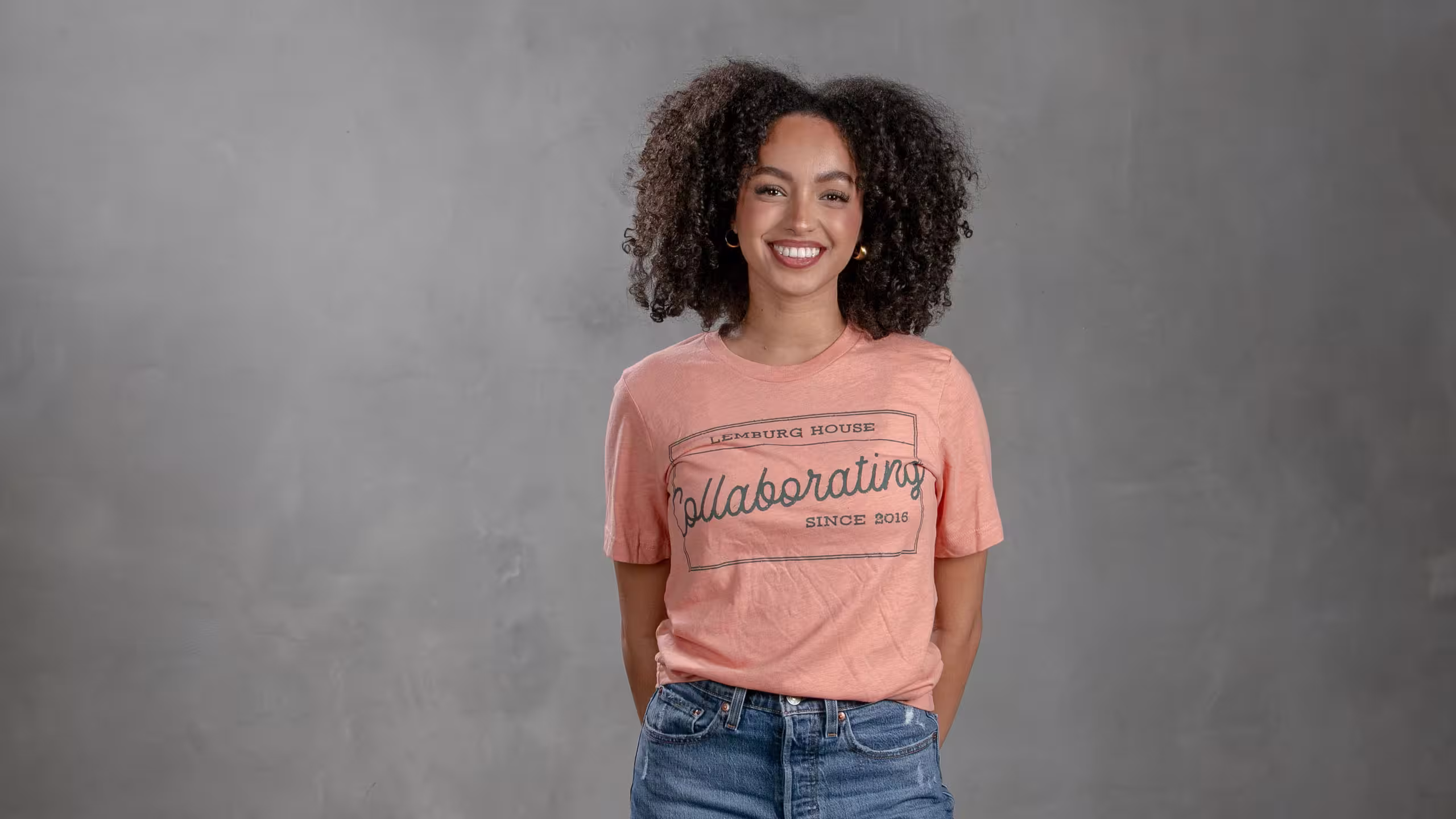 women wearing a peach color t-shirt