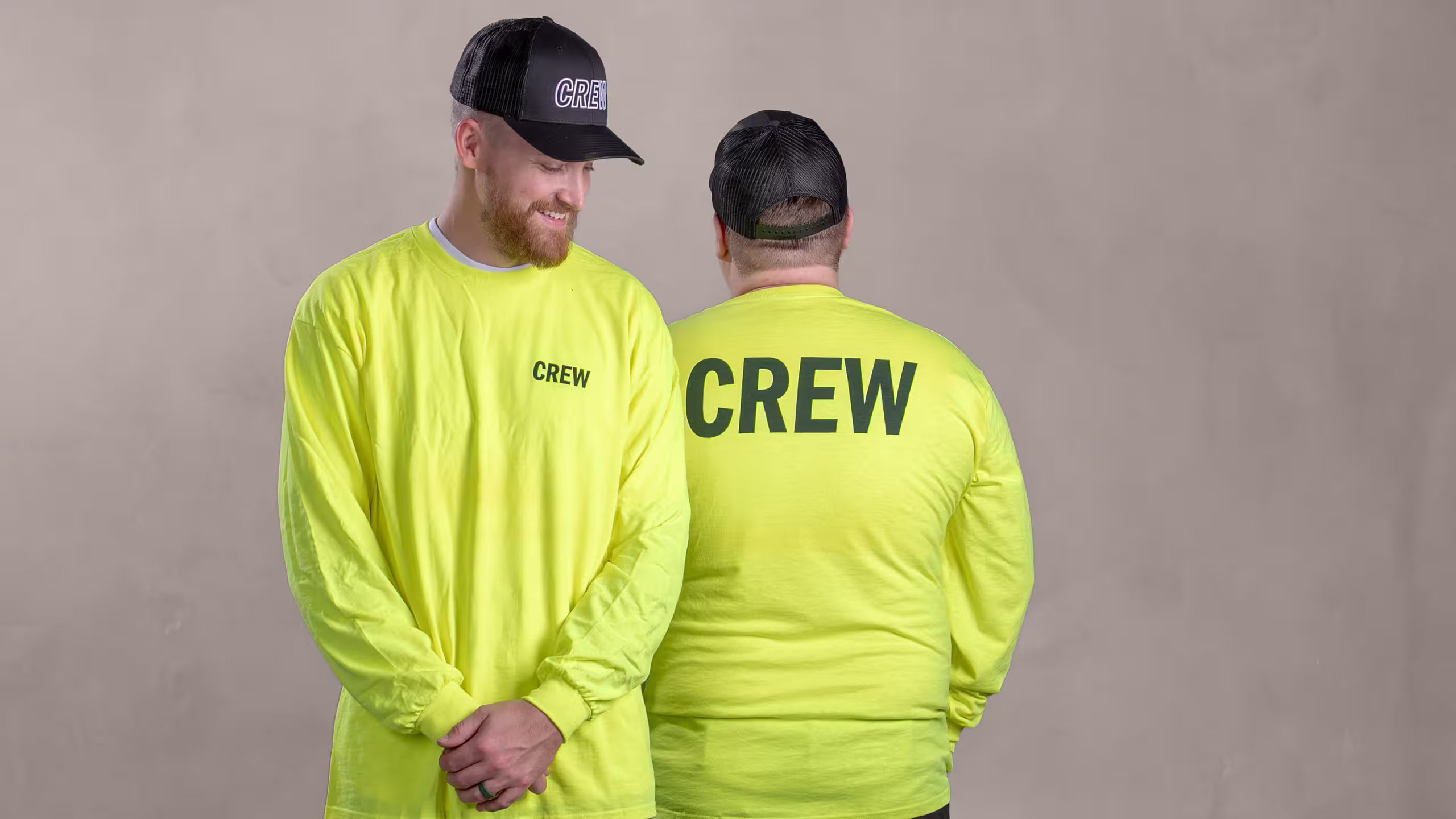 two guys wearing hi-vis UV shirts